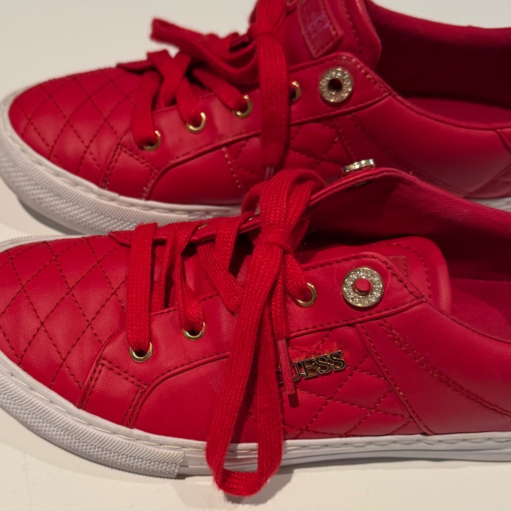 GUESS Red Tennis Shoes new size 8 never worn but once. Guess Loven gold.